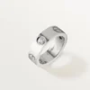 Bague Love, 3 diamants – Or blanc, diamants – Cartier Bague Love, 3 diamants – Or blanc, diamants – Cartier