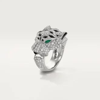 Bague Panthère de Cartier – Or blanc, diamants, émeraudes, onyx – Cartier