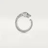 Bague Panthère de Cartier – Or blanc, diamants, émeraudes, onyx – Cartier