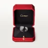 Bague Panthère de Cartier – Or blanc, diamants, émeraudes, onyx – Cartier