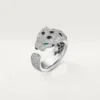Bague Panthère de Cartier – Or blanc, émeraudes, onyx, diamants – Cartier