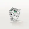 Bague Panthère de Cartier – Or blanc non rhodié, grenats tsavorites, onyx – Cartier
