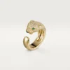 Bague Panthère de Cartier – Or jaune, diamants, émeraudes, onyx – Cartier