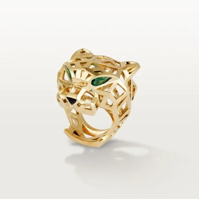 Bague Panthère de Cartier – Or jaune, grenats tsavorites, onyx – Cartier