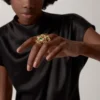 Bague Panthère de Cartier – Or jaune, grenats tsavorites, onyx – Cartier