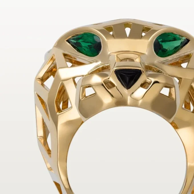 Bague Panthère de Cartier – Or jaune, grenats tsavorites, onyx – Cartier
