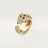 Bague Panthère de Cartier – Or jaune, émeraudes, onyx, diamants – Cartier
