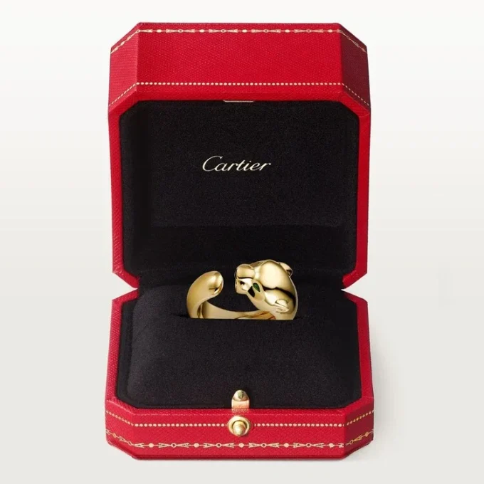 Bague Panthère de Cartier – Or jaune, onyx, grenat tsavorite – Cartier