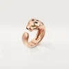 Bague Panthère de Cartier – Or rose, grenats tsavorites, onyx – Cartier