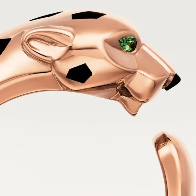 Bague Panthère de Cartier – Or rose, grenats tsavorites, onyx – Cartier
