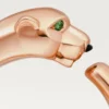 Bague Panthère de Cartier – Or rose, grenats tsavorites, onyx – Cartier