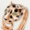 Bague Panthère de Cartier – Or rose, grenats tsavorites, onyx, laque noire, diamants – Cartier
