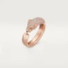 Bague Panthère de Cartier – Or rose, onyx, émeraudes, diamants – Cartier
