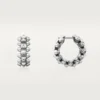 Boucles d&rsquo;oreilles Clash de Cartier, modèle Mini