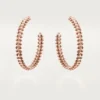 Boucles d&rsquo;oreilles créoles Clash de Cartier, petit modèle – Or rose – Cartier
