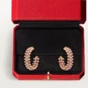 Boucles d&rsquo;oreilles créoles Clash de Cartier, petit modèle, pavées