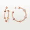 Boucles d&rsquo;oreilles Écrou de Cartier – Or rose – Cartier