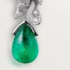 Boucles d&rsquo;oreilles Faune et Flore de Cartier, gouttes d&rsquo;émeraude, pavées