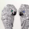 Boucles d&rsquo;oreilles Faune et Flore de Cartier, gouttes d&rsquo;émeraude, pavées