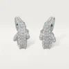 Boucles d&rsquo;oreilles Faune et Flore de Cartier, pavées
