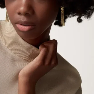 Boucles d&rsquo;oreilles Panthère de Cartier – Or jaune, diamants, grenats tsavorites, onyx – Cartier