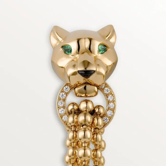 Boucles d&rsquo;oreilles Panthère de Cartier – Or jaune, diamants, grenats tsavorites, onyx – Cartier