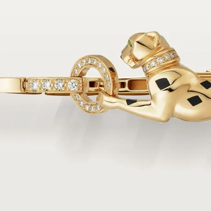 Bracelet Panthère de Cartier – Or jaune, laque, diamant, grenat tsavorite, onyx – Cartier