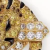 Broche Faune et Flore de Cartier, diamants jaunes, orange et bruns, pavés Broche Faune et Flore de Cartier, diamants jaunes, orange et bruns, pavés