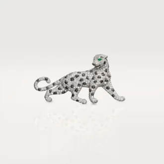 Broche Panthère de Cartier – Or blanc, émeraudes, onyx, diamants – Cartier
