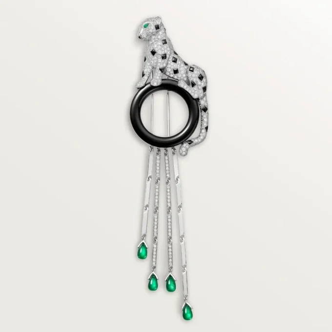 Broche Panthère de Cartier – Or blanc, émeraudes, onyx, diamants – Cartier