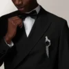 Broche Panthère de Cartier – Or blanc, émeraudes, onyx, diamants – Cartier