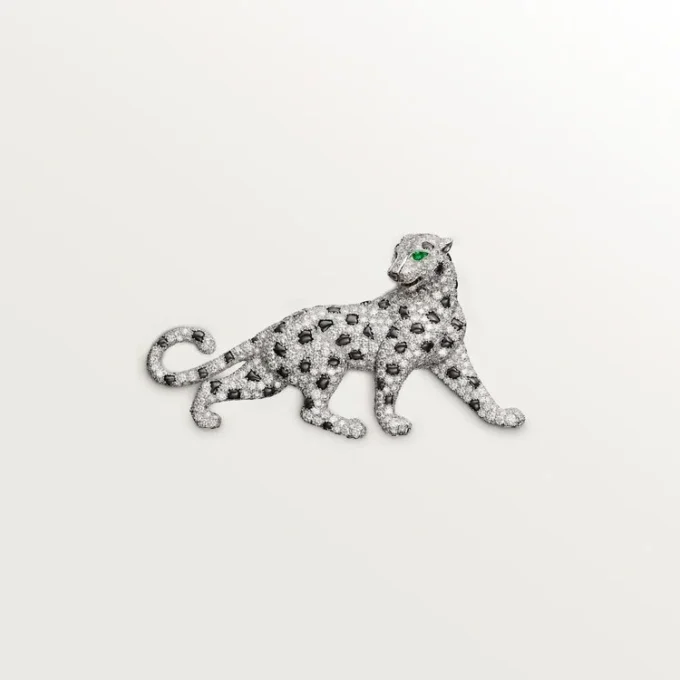 Broche Panthère de Cartier – Or blanc, émeraudes, onyx, diamants – Cartier