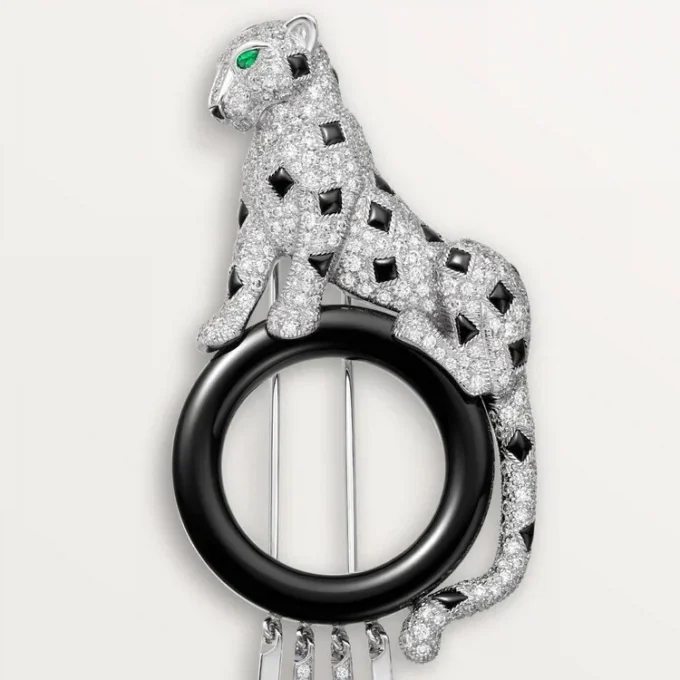 Broche Panthère de Cartier – Or blanc, émeraudes, onyx, diamants – Cartier