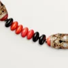 Collier de haute joaillerie – Or rose, corail, onyx, laque noire, diamants – Cartier
