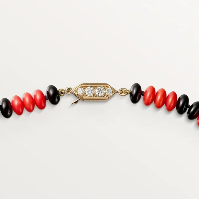 Collier de haute joaillerie – Or rose, corail, onyx, laque noire, diamants – Cartier