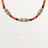 Collier de haute joaillerie – Or rose, corail, onyx, laque noire, diamants – Cartier