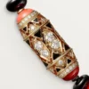 Collier de haute joaillerie – Or rose, corail, onyx, laque noire, diamants – Cartier