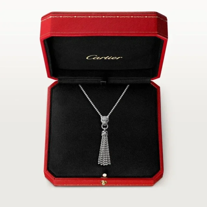 Collier Panthère de Cartier – Or blanc, laque noire, émeraudes, onyx, diamants – Cartier