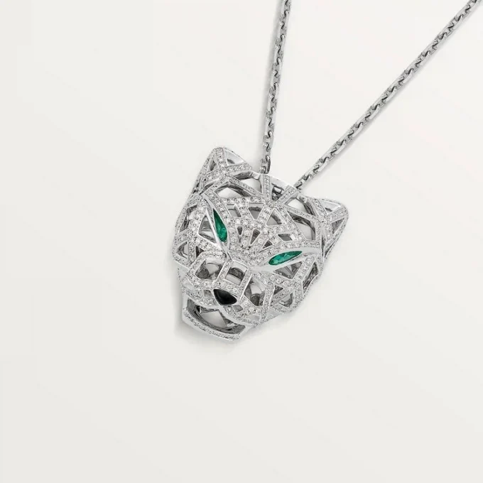 Collier Panthère de Cartier – Or blanc, émeraudes, diamants, onyx – Cartier
