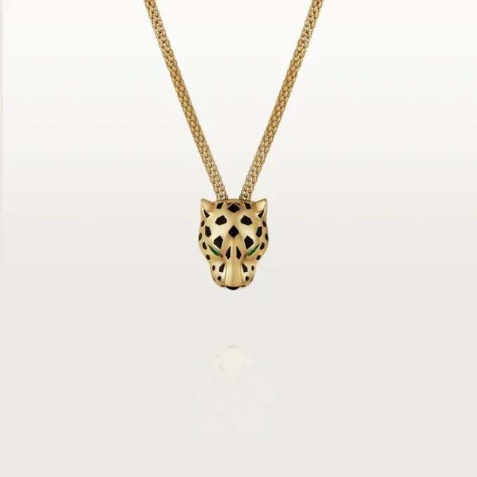 Collier Panthère de Cartier – Or jaune, laque, diamants, grenat tsavorite, onyx – Cartier