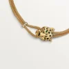 Collier Panthère de Cartier – Or jaune, laque, diamants, grenat tsavorite, onyx – Cartier