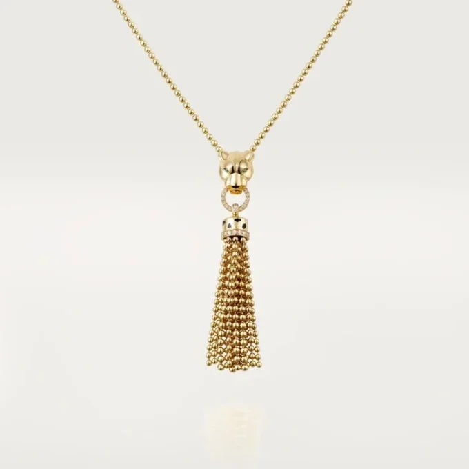Collier Panthère de Cartier – Or jaune, laque noire, grenats tsavorites, onyx, diamants – Cartier