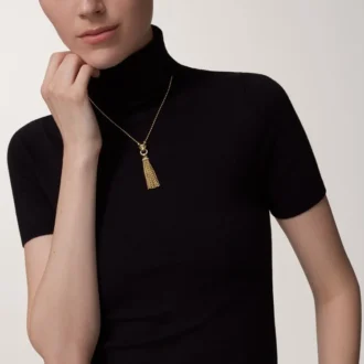 Collier Panthère de Cartier – Or jaune, laque noire, grenats tsavorites, onyx, diamants – Cartier