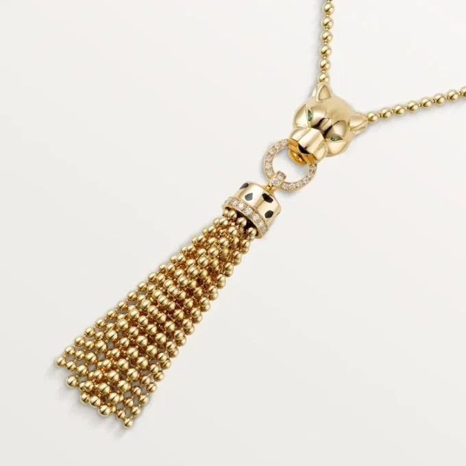 Collier Panthère de Cartier – Or jaune, laque noire, grenats tsavorites, onyx, diamants – Cartier