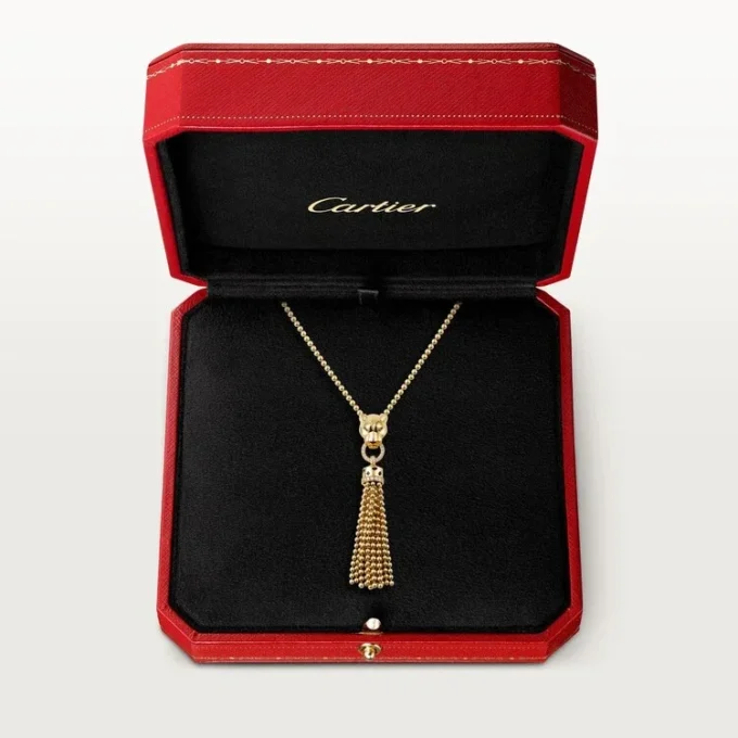 Collier Panthère de Cartier – Or jaune, laque noire, grenats tsavorites, onyx, diamants – Cartier