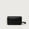 Mini sac à chaîne, Double C de Cartier – Cuir de veau noir, finition en or et émail noir – Cartier Mini sac à chaîne, Double C de Cartier – Cuir de veau noir, finition en or et émail noir – Cartier