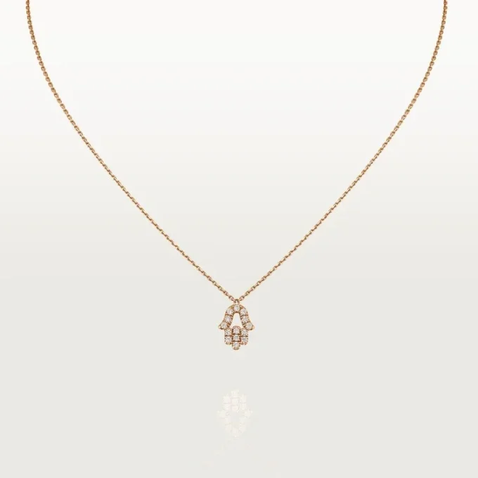 Pendentif Cœurs et symboles – Or rose, diamants – Cartier