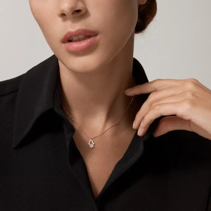 Pendentif Cœurs et symboles – Or rose, diamants – Cartier