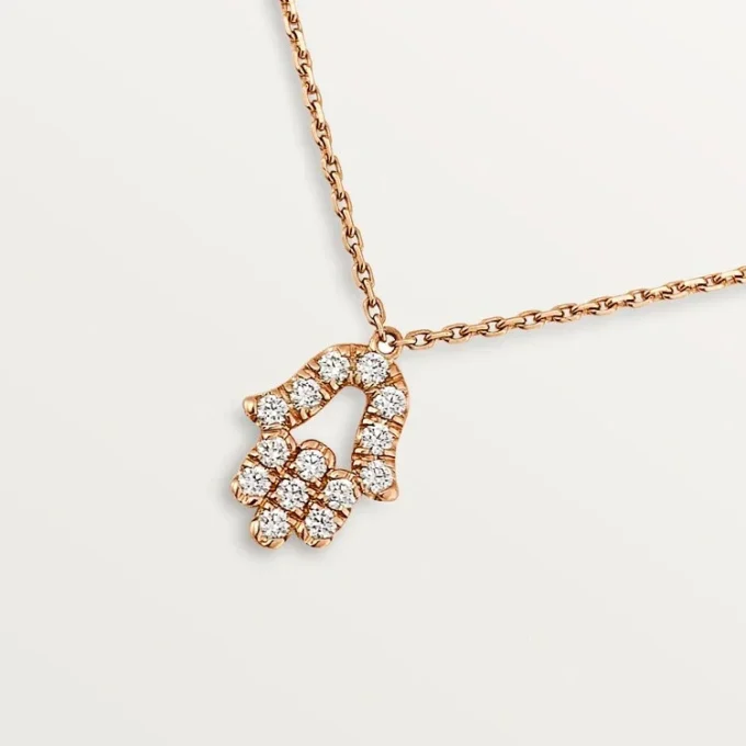 Pendentif Cœurs et symboles – Or rose, diamants – Cartier