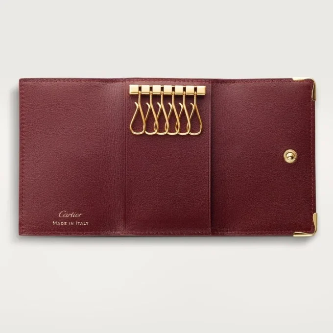Porte-clés 6 clés, Must de Cartier – Cuir de veau bordeaux, finition dorée – Cartier